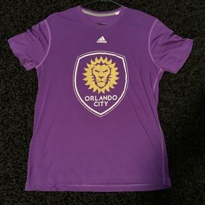 Orlando City soccer jersey.